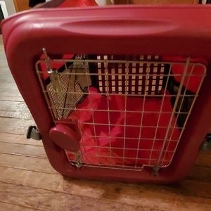 A collapsible dog crate